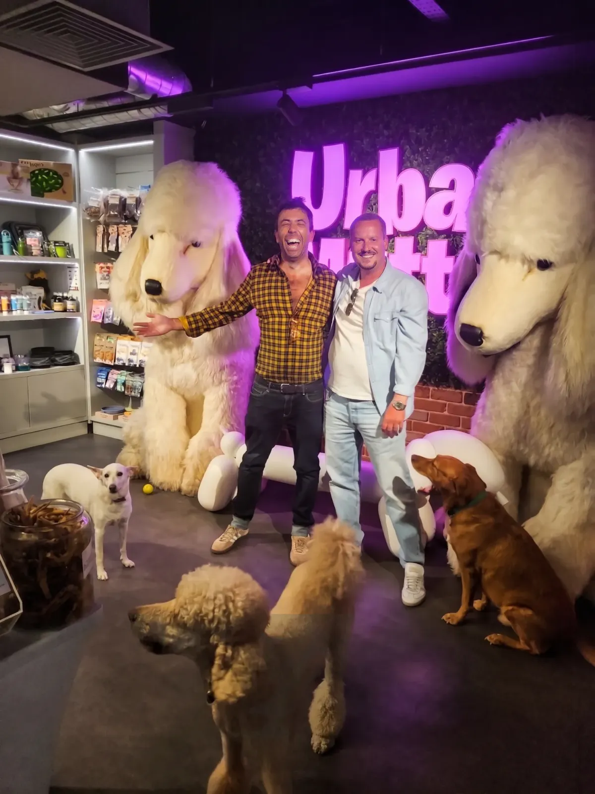Gregory Hands, founder of Urban Mutts Hotels at Westfield London, and Edoardo L'Astorina, founder of tech company Blu Frame, pictured with their dogs Bianca, Tristan and Bruce to announce Urban Mutts' first online store.